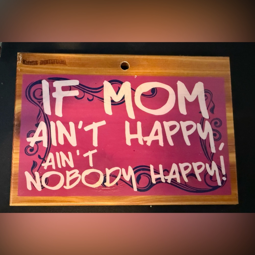 Pink Wooden Sign with White Text